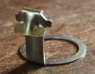 Parts of a European sanke keg valve, photographed close up